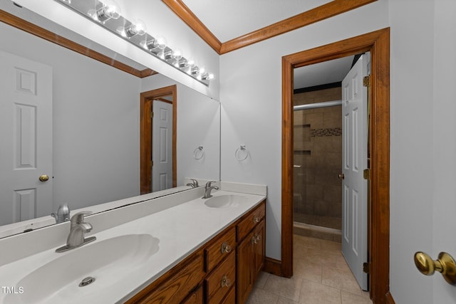 221 Jansmith Ln, Raleigh, NC 27615 - bathroom featuring double vanity, a stall shower, tile patterned floors, baseboards, and ornamental molding