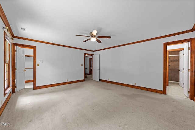 221 Jansmith Ln, Raleigh, NC 27615 - empty room featuring a ceiling fan, light colored carpet, crown molding, and baseboards