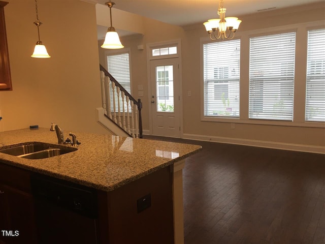 921 Rosepine Dr, Cary, NC 27519 - kitchen featuring a sink, black dishwasher, dark wood-style flooring, baseboards, and a chandelier