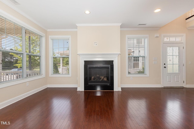 921 Rosepine Dr, Cary, NC 27519 - unfurnished living room featuring hardwood / wood-style flooring, a glass covered fireplace, ornamental molding, and recessed lighting