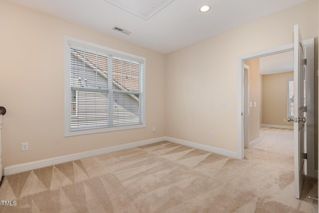 921 Rosepine Dr, Cary, NC 27519 - empty room with light colored carpet, recessed lighting, and attic access