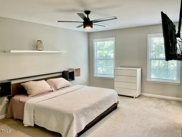 166 Gulley Glen Dr, Garner, NC 27529 - carpeted bedroom with baseboards and a ceiling fan