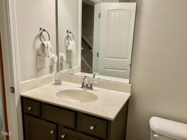 166 Gulley Glen Dr, Garner, NC 27529 - half bath featuring vanity and toilet