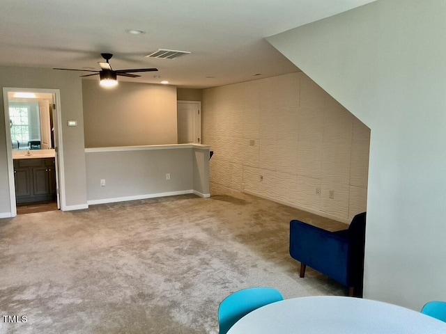 166 Gulley Glen Dr, Garner, NC 27529 - unfurnished living room with ceiling fan, carpet flooring, and recessed lighting