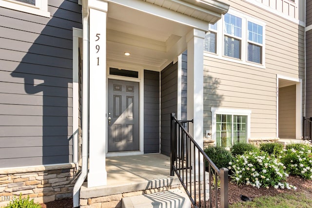 591 Traditions Grande Blvd, Wake Forest, NC 27587 - view of exterior entry with stone siding and covered porch
