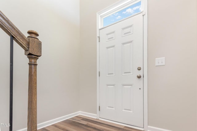 591 Traditions Grande Blvd, Wake Forest, NC 27587 - entrance foyer with dark wood-style floors and baseboards