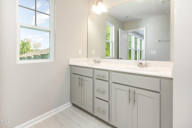 591 Traditions Grande Blvd, Wake Forest, NC 27587 - full bathroom featuring double vanity and baseboards