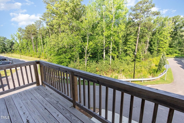591 Traditions Grande Blvd, Wake Forest, NC 27587 - wooden deck with a view of trees