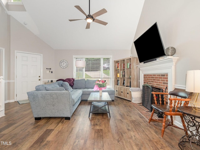 1426 Cedar Branch Ct, Wake Forest, NC 27587 - living room with high vaulted ceiling, ceiling fan, wood finished floors, and a fireplace