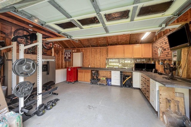 701 Creekside Dr, Clayton, NC 27520 - garage featuring a workshop area