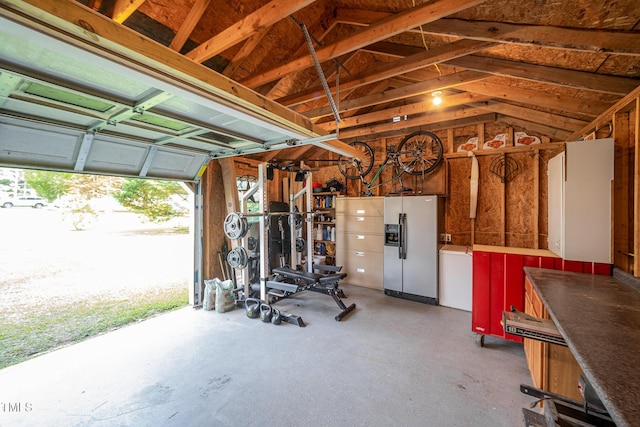 701 Creekside Dr, Clayton, NC 27520 - garage featuring fridge with ice dispenser