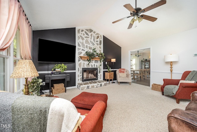 701 Creekside Dr, Clayton, NC 27520 - living room featuring vaulted ceiling, a fireplace, ceiling fan, and carpet floors