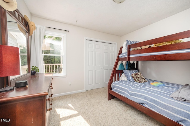 701 Creekside Dr, Clayton, NC 27520 - bedroom featuring baseboards, carpet flooring, and a closet