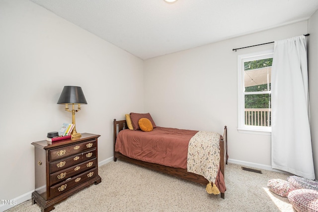 701 Creekside Dr, Clayton, NC 27520 - bedroom featuring baseboards and carpet