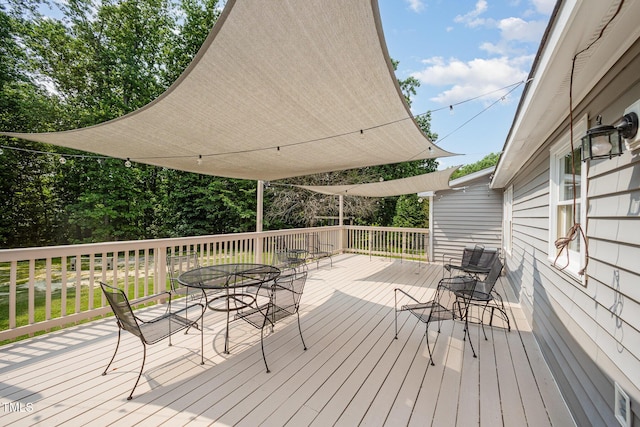 701 Creekside Dr, Clayton, NC 27520 - wooden deck featuring outdoor dining space