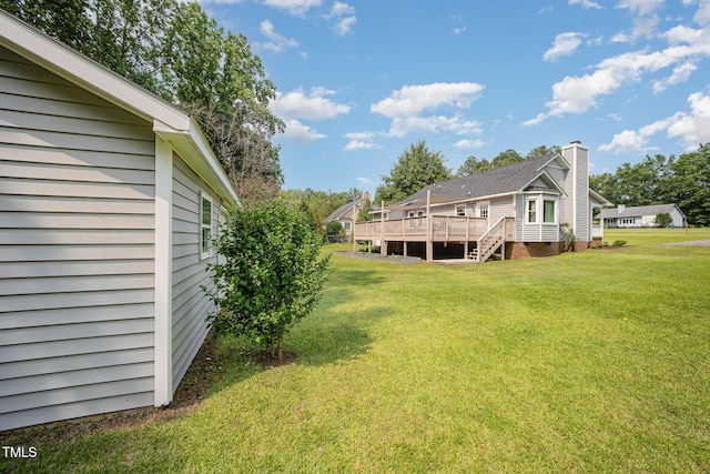 701 Creekside Dr, Clayton, NC 27520 - view of green lawn with a deck