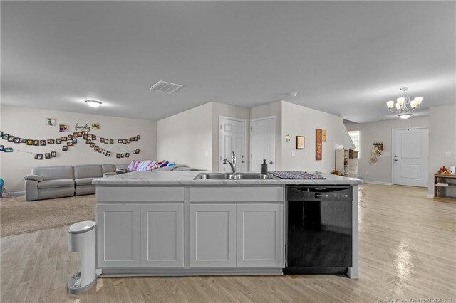 259 Desert Orchid Cir, Raeford, NC 28376 - kitchen featuring dishwasher, open floor plan, a sink, and a chandelier