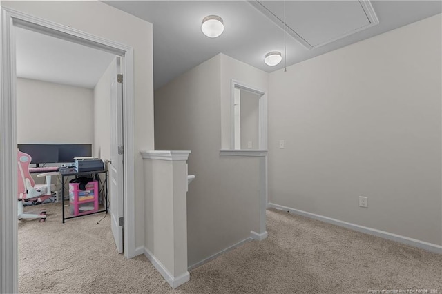 259 Desert Orchid Cir, Raeford, NC 28376 - hallway with attic access, carpet floors, an upstairs landing, and baseboards