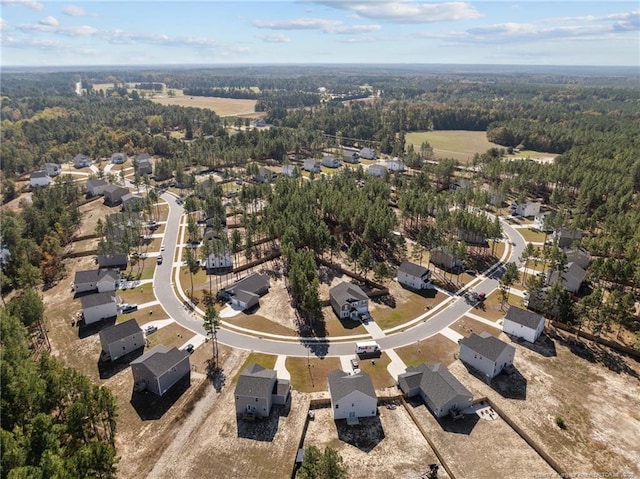 259 Desert Orchid Cir, Raeford, NC 28376 - aerial view of property's location with nearby suburban area and a forest