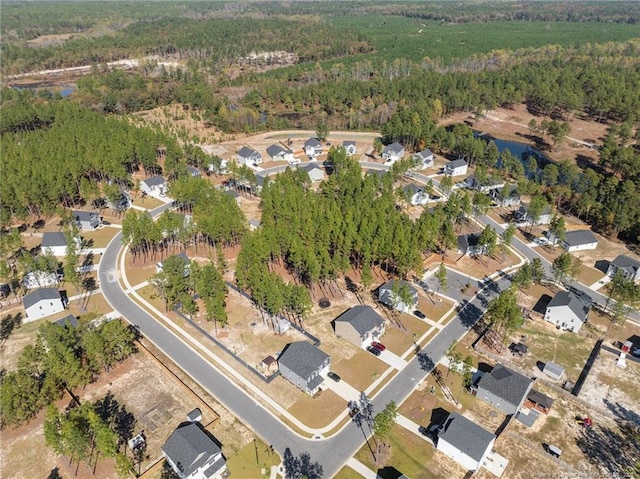 259 Desert Orchid Cir, Raeford, NC 28376 - aerial overview of property's location with a forest and nearby suburban area