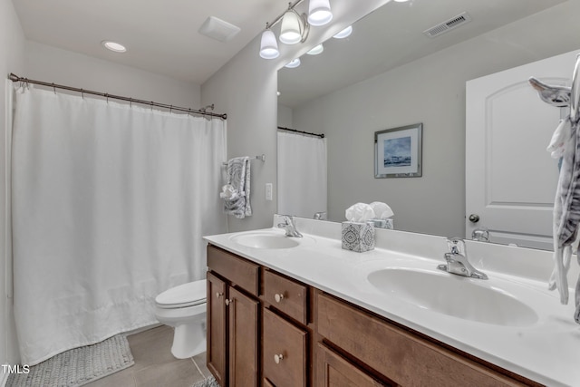 6509 Conaway Ct, Wake Forest, NC 27587 - bathroom featuring tile patterned floors, toilet, double vanity, and curtained shower