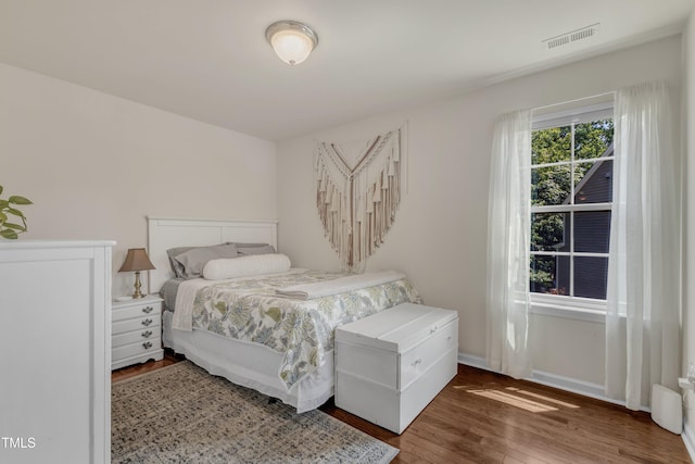 6509 Conaway Ct, Wake Forest, NC 27587 - bedroom featuring wood finished floors and baseboards