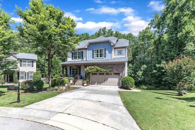 6509 Conaway Ct, Wake Forest, NC 27587 - traditional home featuring board and batten siding, concrete driveway, an attached garage, a front lawn, and stone siding