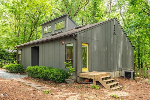 120 Polks Landing Rd, Chapel Hill, NC 27516 - view of home's exterior with a shingled roof and central AC