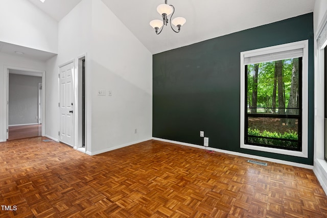 120 Polks Landing Rd, Chapel Hill, NC 27516 - empty room with a chandelier, baseboards, and high vaulted ceiling