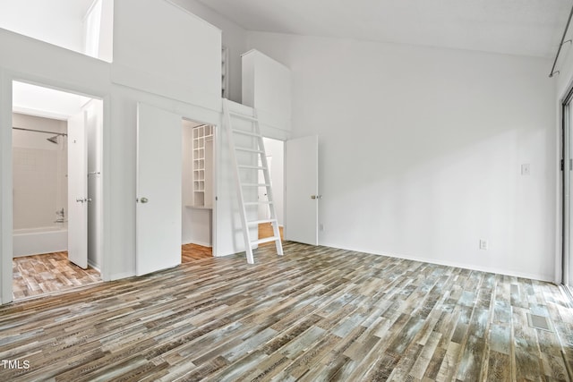 120 Polks Landing Rd, Chapel Hill, NC 27516 - unfurnished bedroom featuring wood finished floors, a closet, a walk in closet, ensuite bathroom, and baseboards