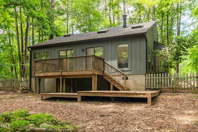 120 Polks Landing Rd, Chapel Hill, NC 27516 - rear view of house featuring stairway, a wooden deck, and roof with shingles