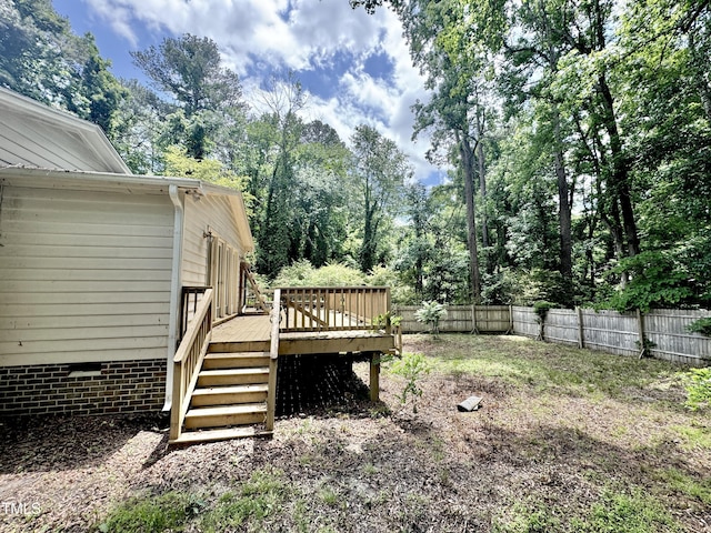 322 S Dixon Ave, Cary, NC 27511 - fenced backyard featuring a deck and stairway