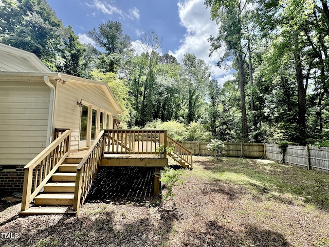 322 S Dixon Ave, Cary, NC 27511 - fenced backyard featuring stairway and a wooden deck