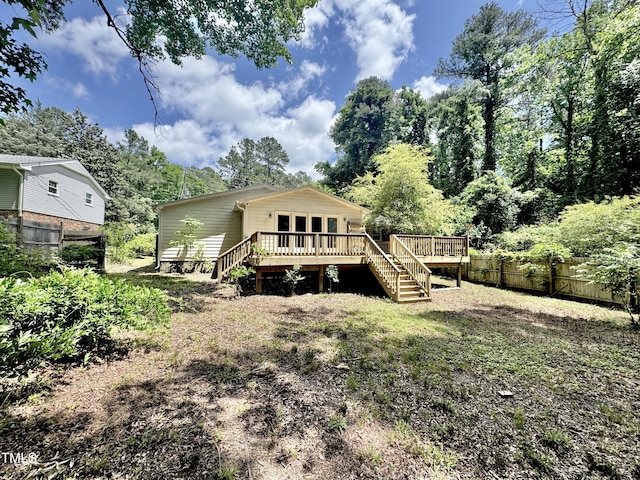 322 S Dixon Ave, Cary, NC 27511 - back of property with a wooden deck and stairway