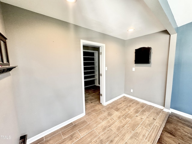322 S Dixon Ave, Cary, NC 27511 - unfurnished room with baseboards, light wood-style floors, and recessed lighting