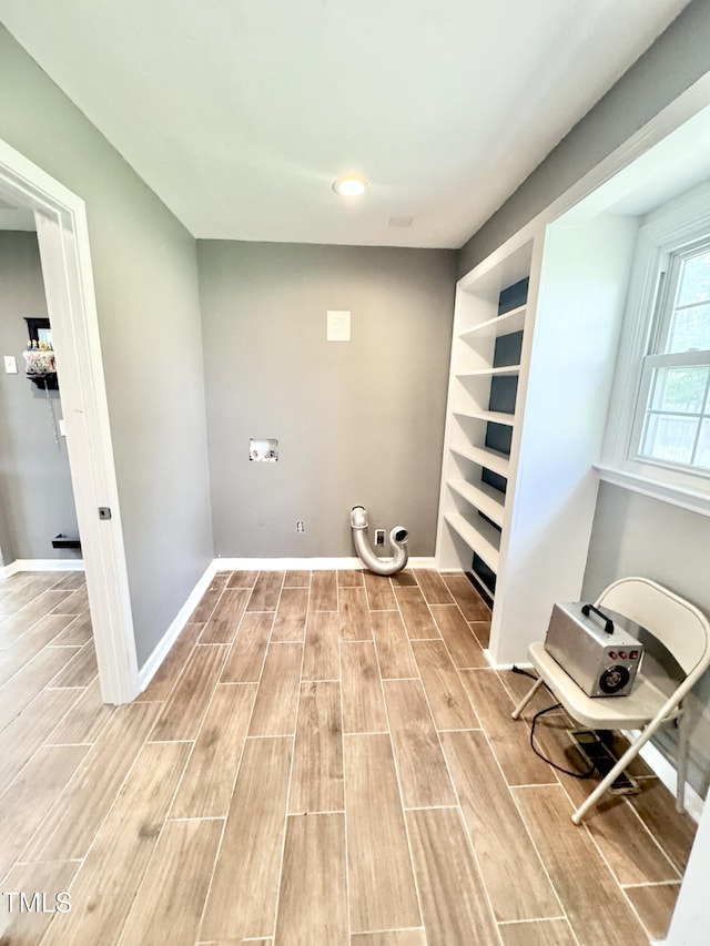 322 S Dixon Ave, Cary, NC 27511 - laundry room featuring light wood finished floors, baseboards, and recessed lighting