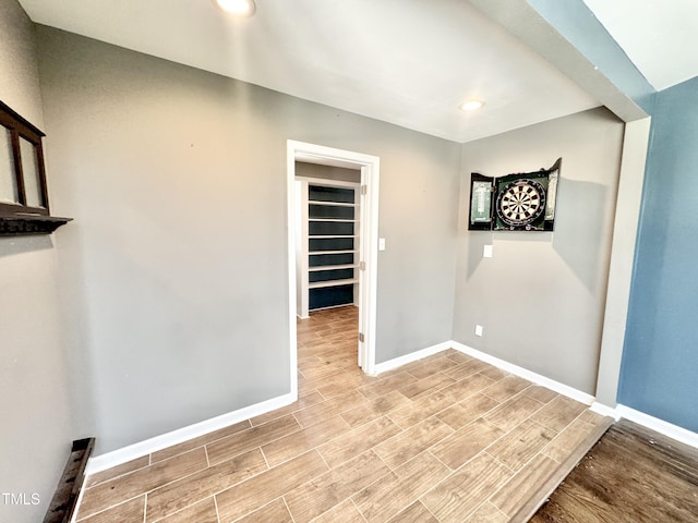 322 S Dixon Ave, Cary, NC 27511 - spare room with wood finished floors, baseboards, and recessed lighting