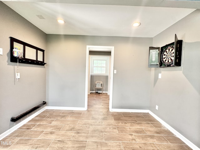 322 S Dixon Ave, Cary, NC 27511 - laundry room featuring baseboards and recessed lighting