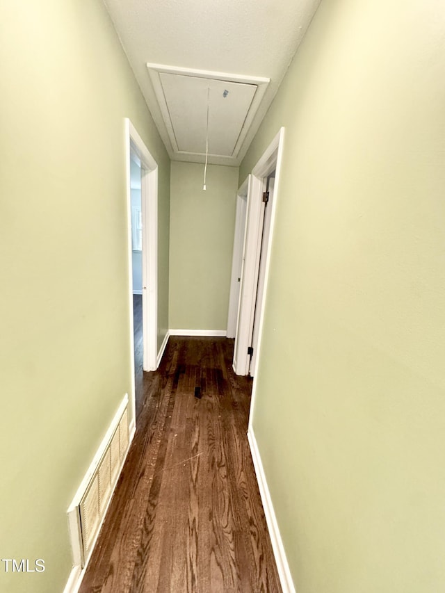 322 S Dixon Ave, Cary, NC 27511 - hallway with attic access, wood finished floors, and baseboards