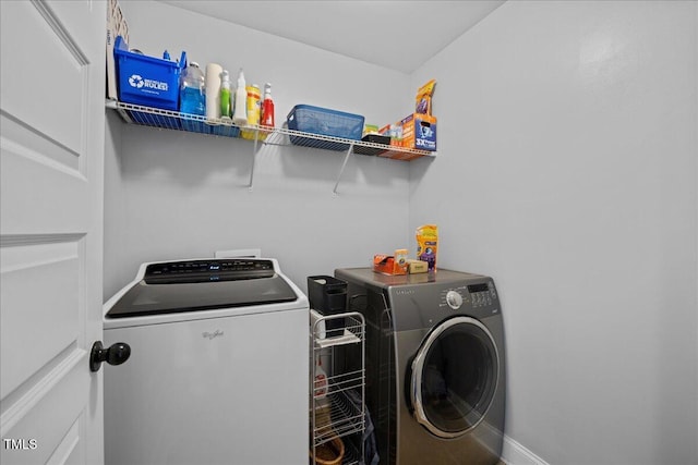 224 Swann Trl, Clayton, NC 27527 - laundry room featuring separate washer and dryer and baseboards