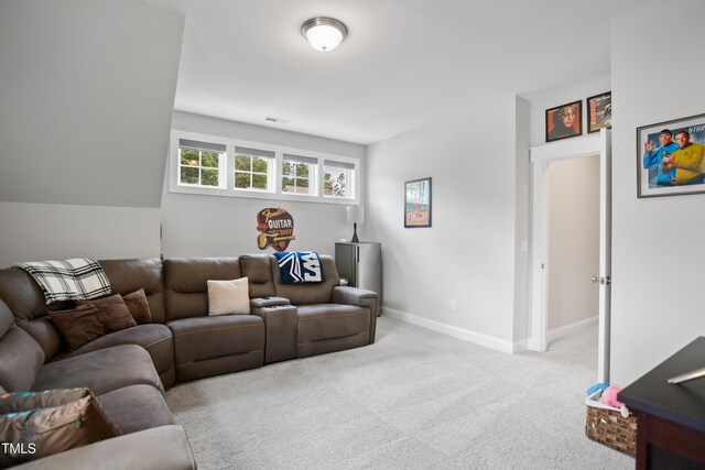 8909 Tara Hill Ln, Wake Forest, NC 27587 - living room with carpet floors and baseboards