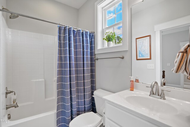 8909 Tara Hill Ln, Wake Forest, NC 27587 - bathroom with toilet, shower / bathtub combination with curtain, and vanity