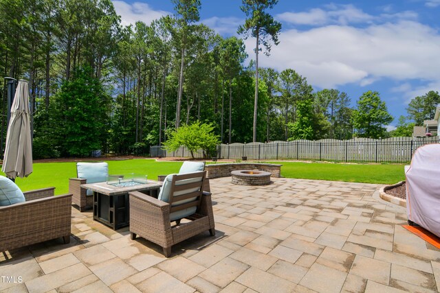 8909 Tara Hill Ln, Wake Forest, NC 27587 - view of patio / terrace with an outdoor fire pit