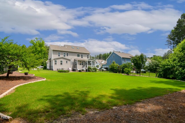 8909 Tara Hill Ln, Wake Forest, NC 27587 - rear view of property with a lawn