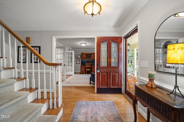 102 Pin Oak Ct, Elon, NC 27244 - foyer featuring stairs, light wood finished floors, ornamental molding, french doors, and baseboards