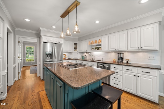 102 Pin Oak Ct, Elon, NC 27244 - kitchen featuring appliances with stainless steel finishes, white cabinetry, a sink, light wood-style floors, and recessed lighting