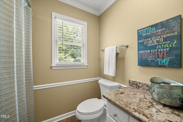 102 Pin Oak Ct, Elon, NC 27244 - bathroom featuring crown molding, toilet, vanity, and baseboards