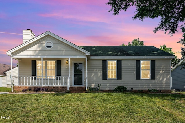 2108 Carthage Cir, Raleigh, NC 27604 - ranch-style house featuring covered porch, a lawn, and a chimney