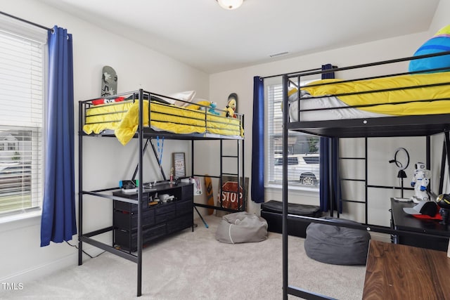 404 Porterfield Dr, Youngsville, NC 27596 - carpeted bedroom featuring baseboards