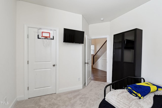 404 Porterfield Dr, Youngsville, NC 27596 - bedroom with carpet floors and baseboards